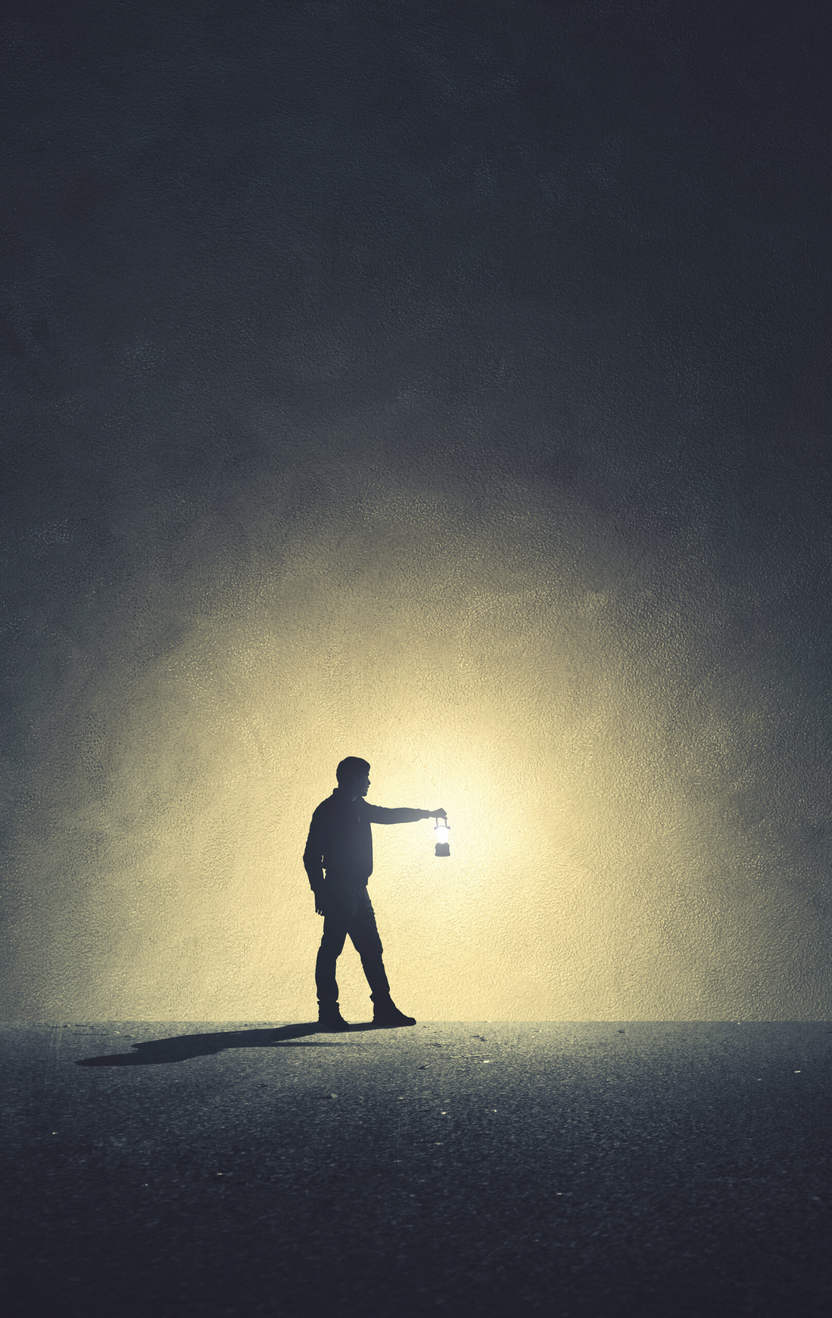 man with lamp walking illuminating his path